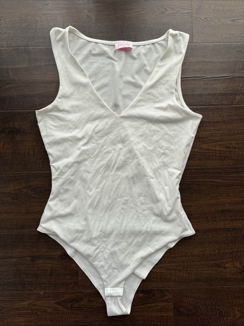 Pink Lily body suit